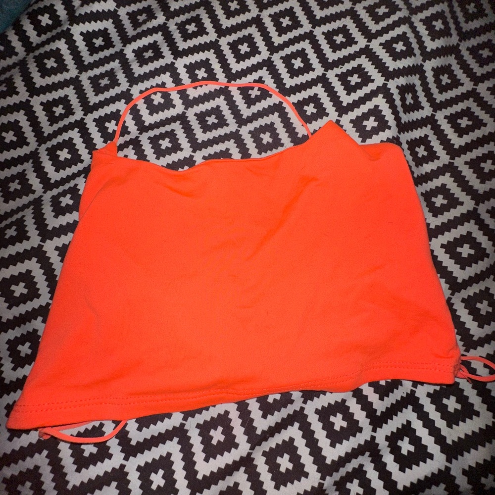 Cross tank tops
